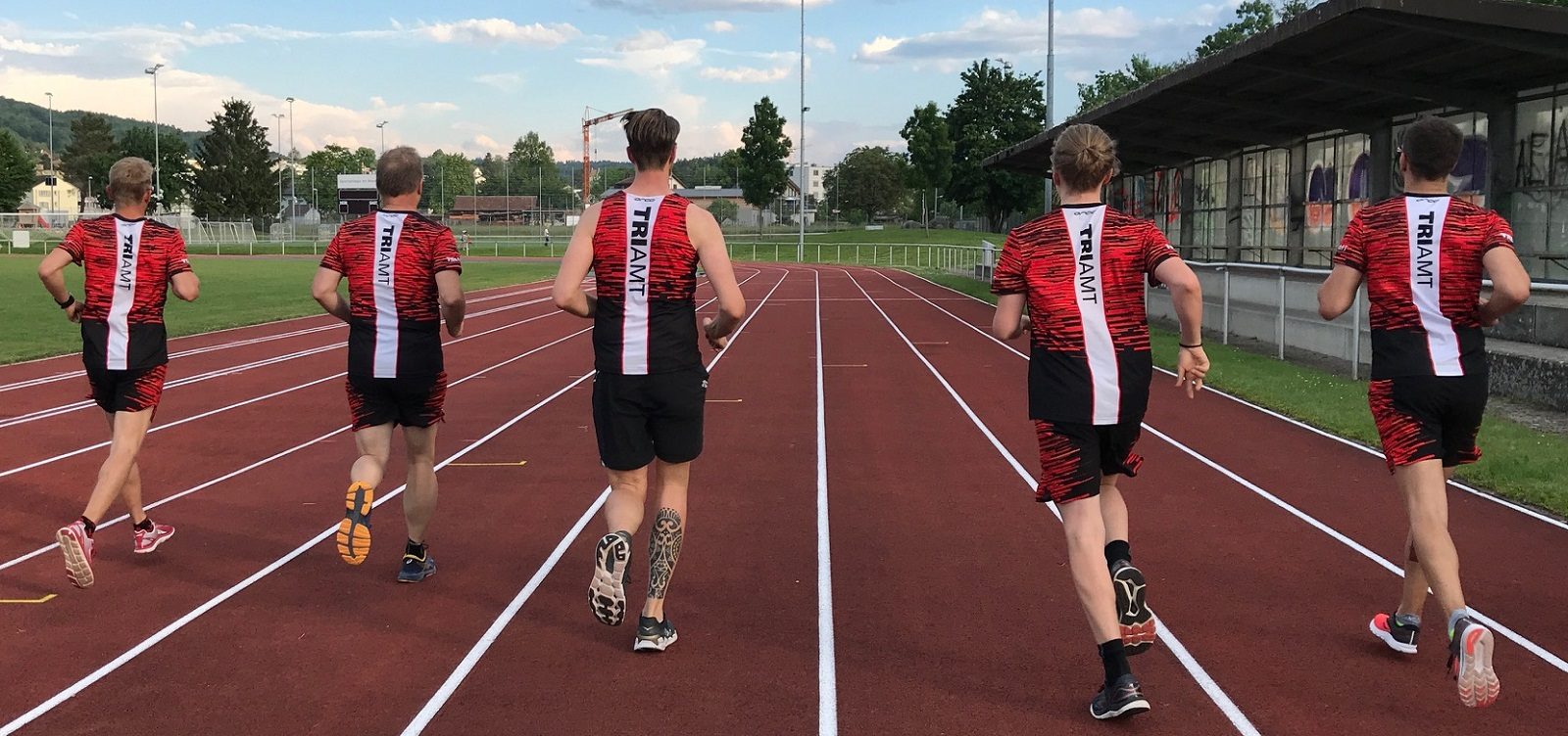 Runners in Triamt kit on the track at the Sportanlage Moos